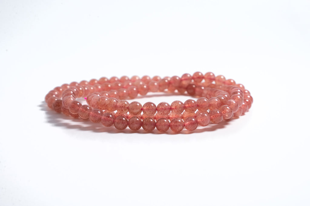 Four-loop Strawberry Quartz