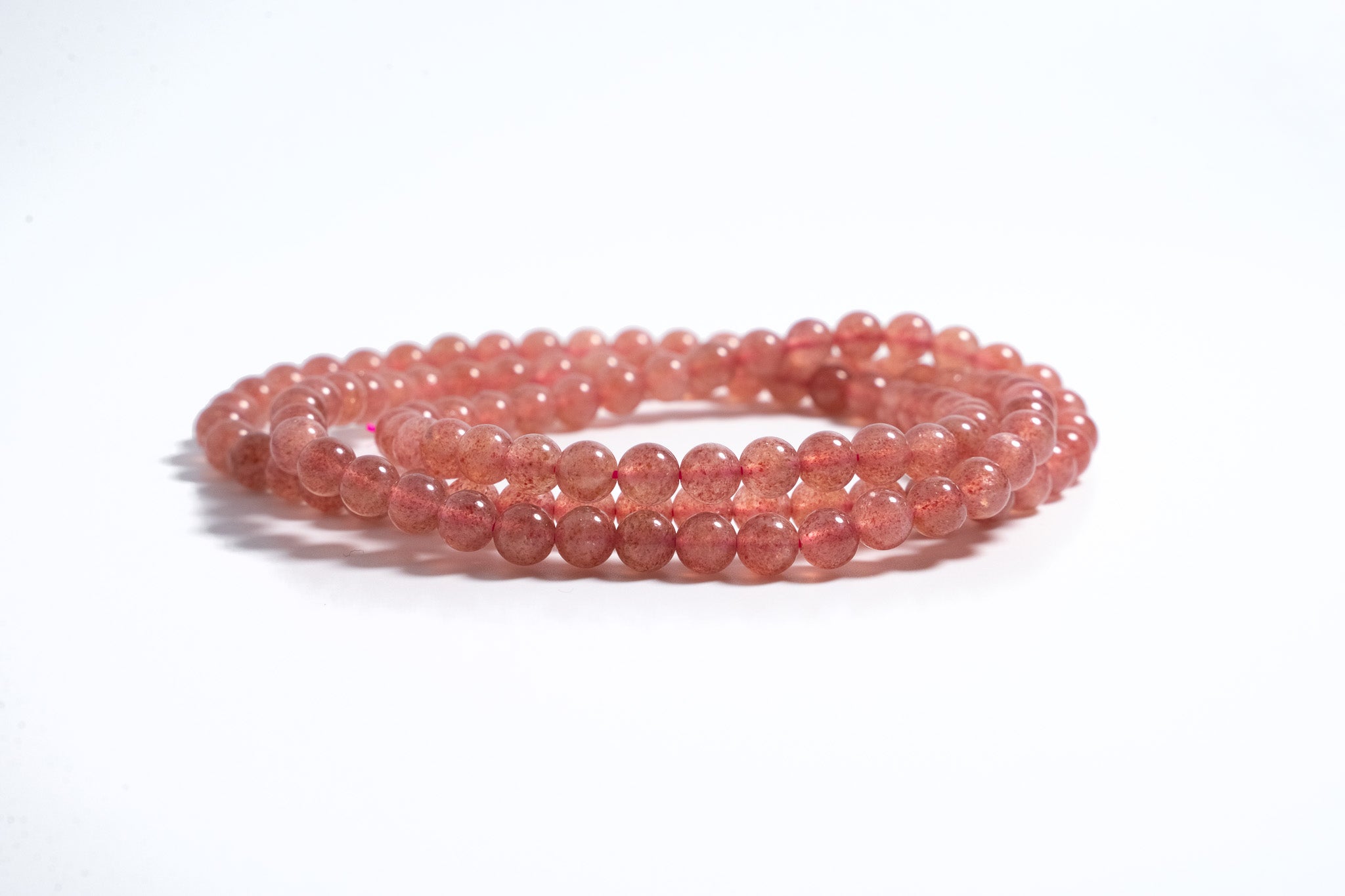 Four-loop Strawberry Quartz