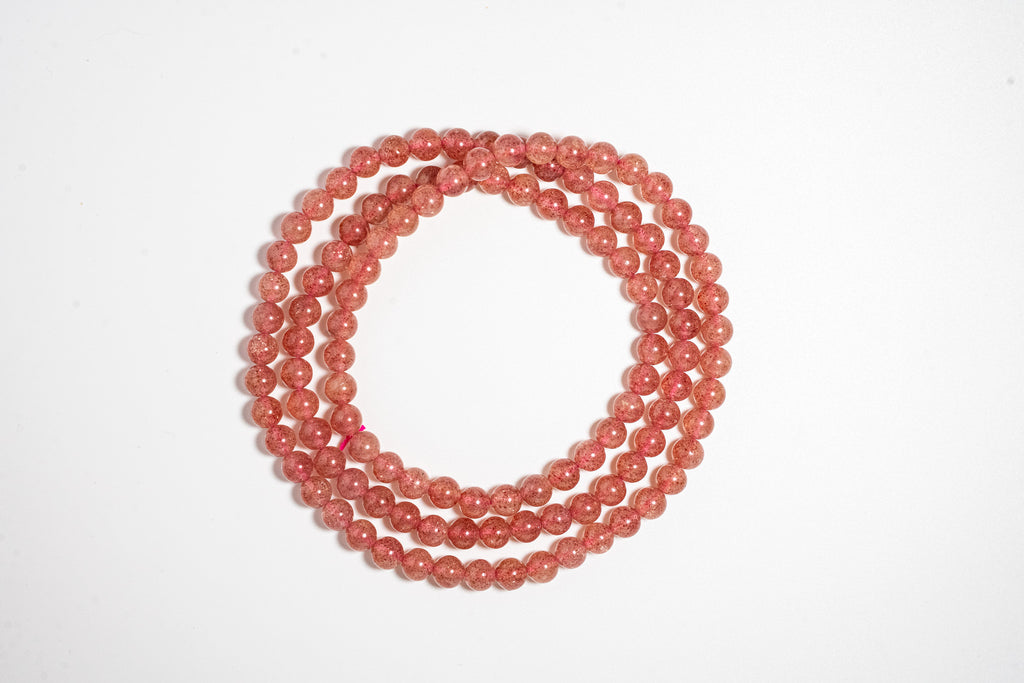 Four-loop Strawberry Quartz